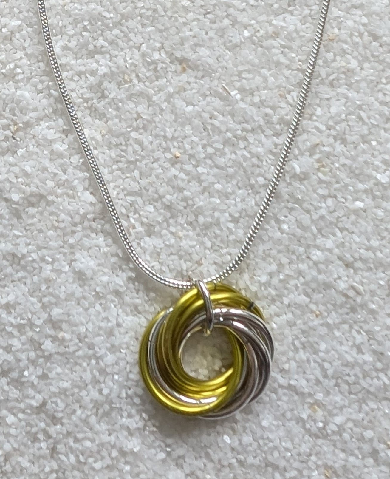 Yellow and Sterling Silver Love Knot necklace