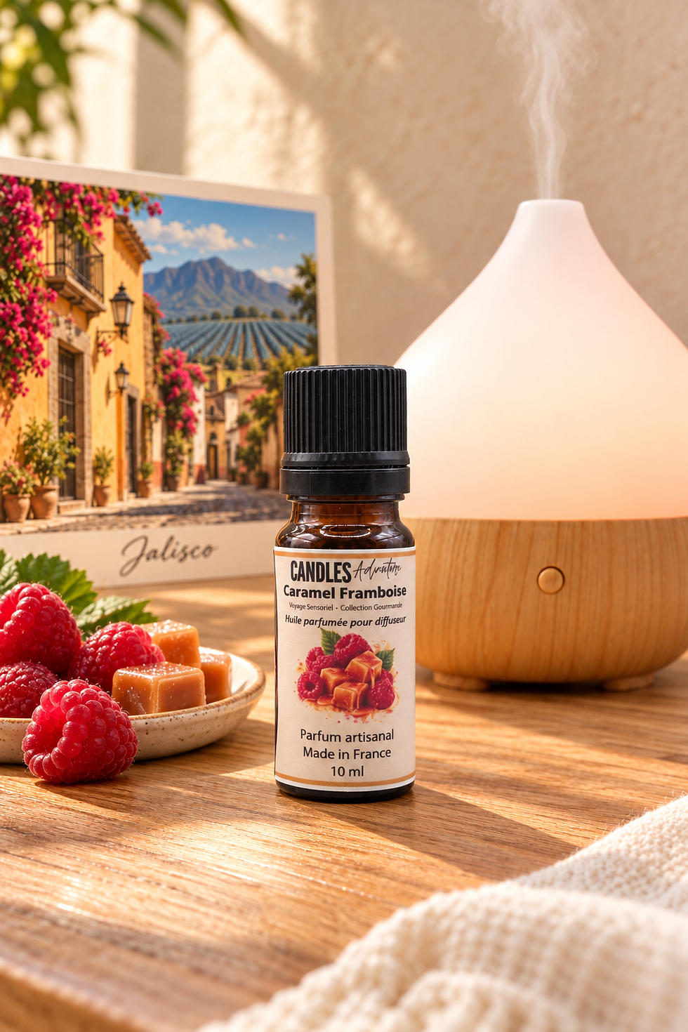 Huile parfumée Caramel Framboise 10 ml Candles Adventure, avec diffuseur ultrasonique et carte postale de Jalisco.