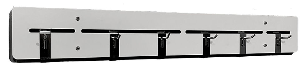 A Ruler Rack is an 5"x 36" flat rack that is hung on two nails.  It has 6 movable hooks that you can hang quilt rulers on.  The rack can hold as many as 42 quilt rulers. 