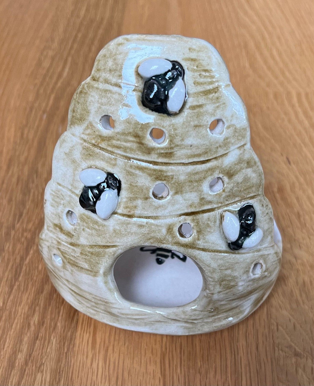 Bee hive tea light holder
