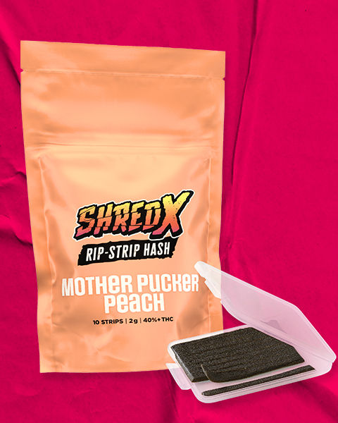 A peach bag of SHRED Mother Pucker Peach, with rip-strip hash in front.