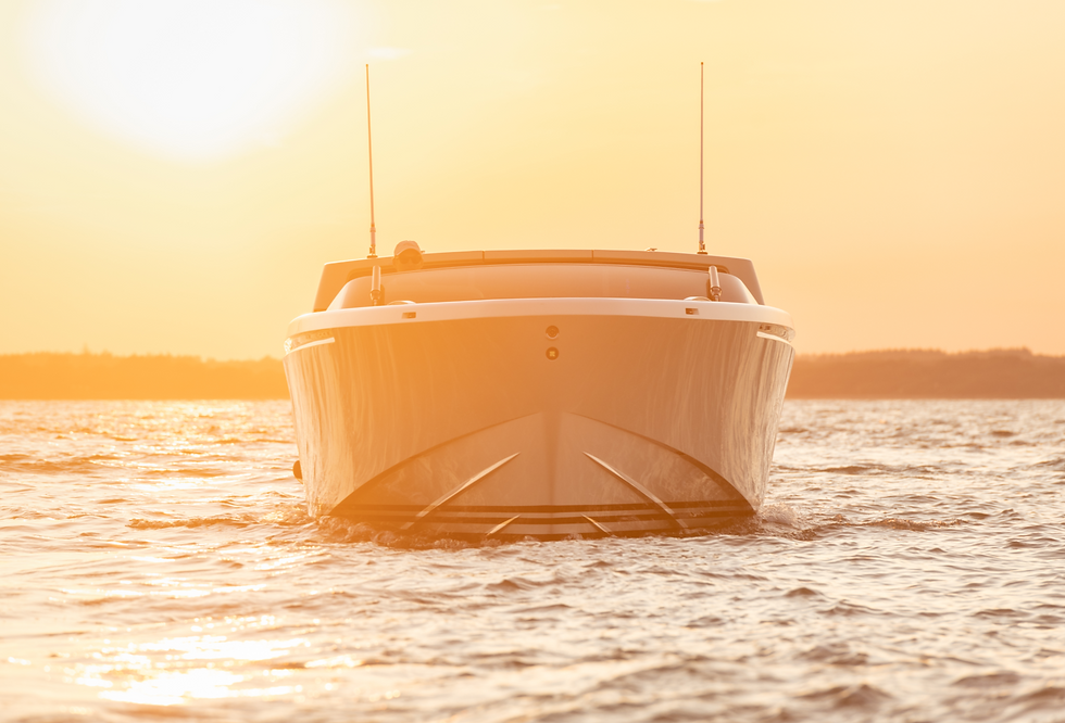 Beautifull tender boat with sunset