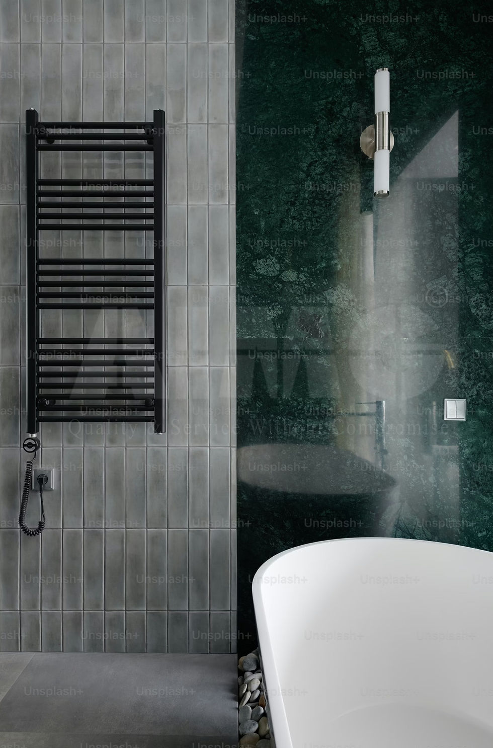Contemporary bathroom wall with Verde Guatemala marble accent panel by Aravali marbles
