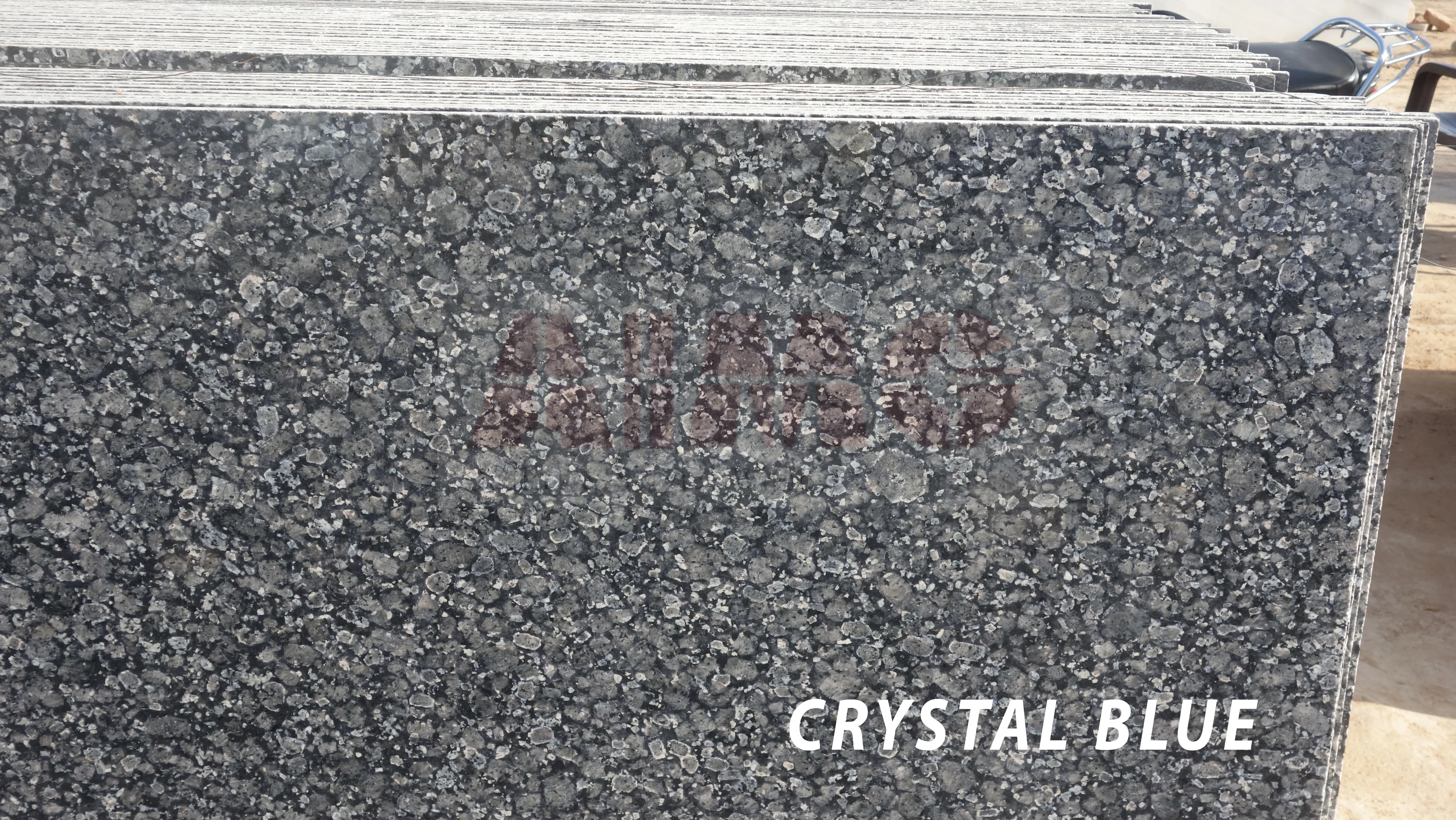Crystal Blue Granite slab by Aravali Marbles with dense blue-grey crystalline texture for durable kitchen countertops and wall cladding
