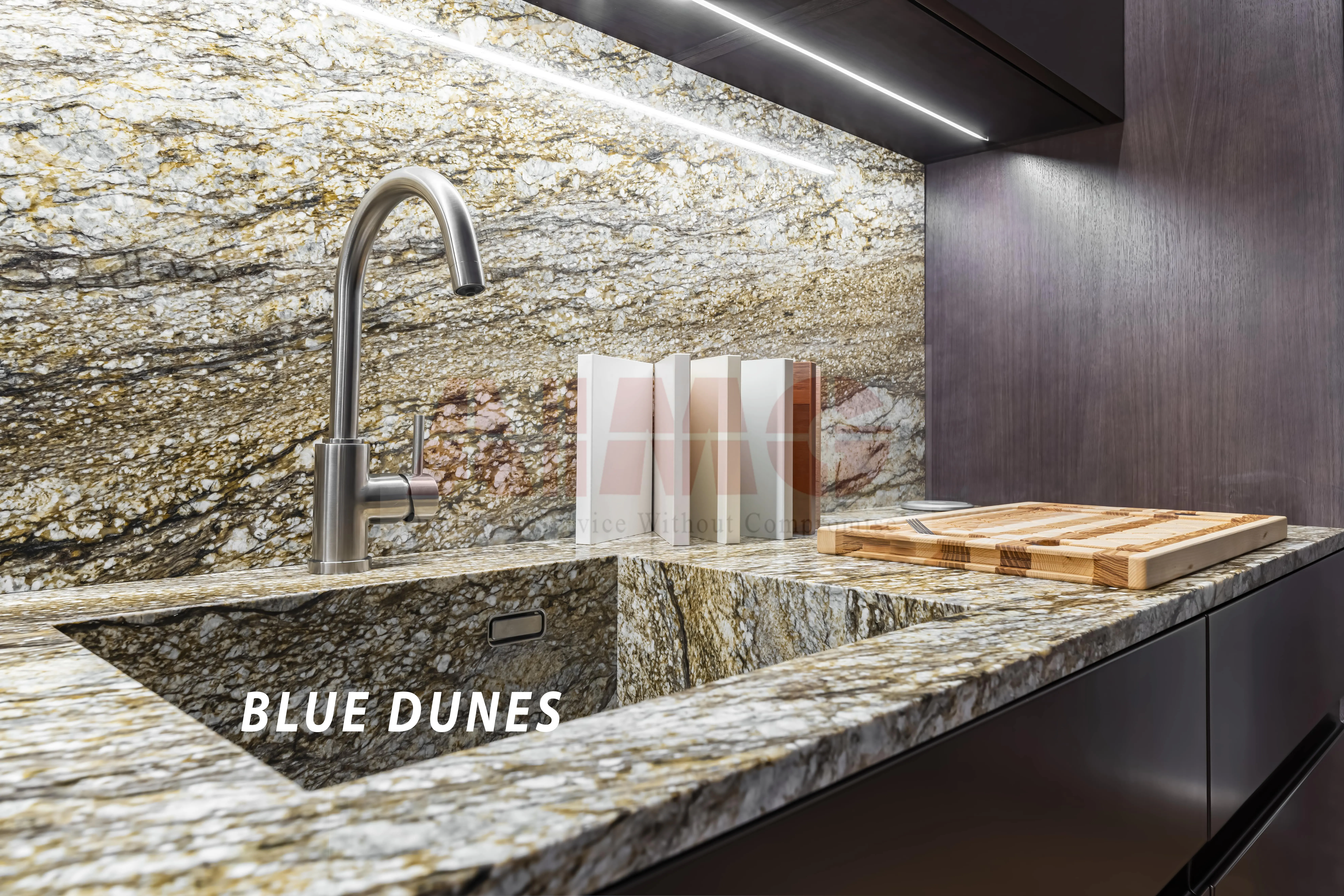 Blue Dunes Granite kitchen countertop by Aravali Marbles featuring dramatic flowing patterns for luxury modular kitchen interiors