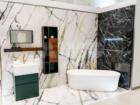 Spider Green Marble accent wall by Aravali Marbles in a luxury bathroom, combining premium Indian natural marble with elegant modern interior design.