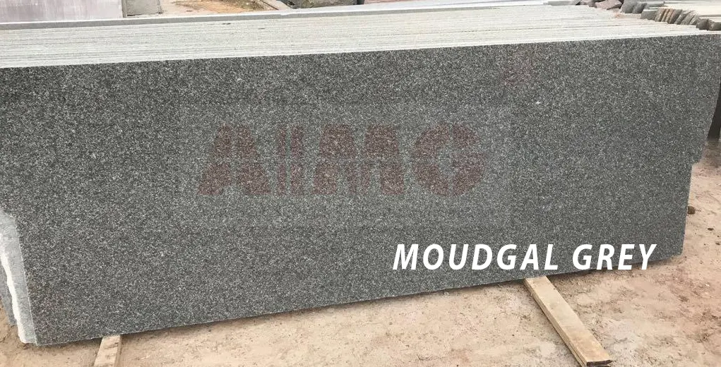 Moudgal Grey Granite slab by Aravali Marbles with fine-grain grey surface ideal for contemporary kitchen countertop designs