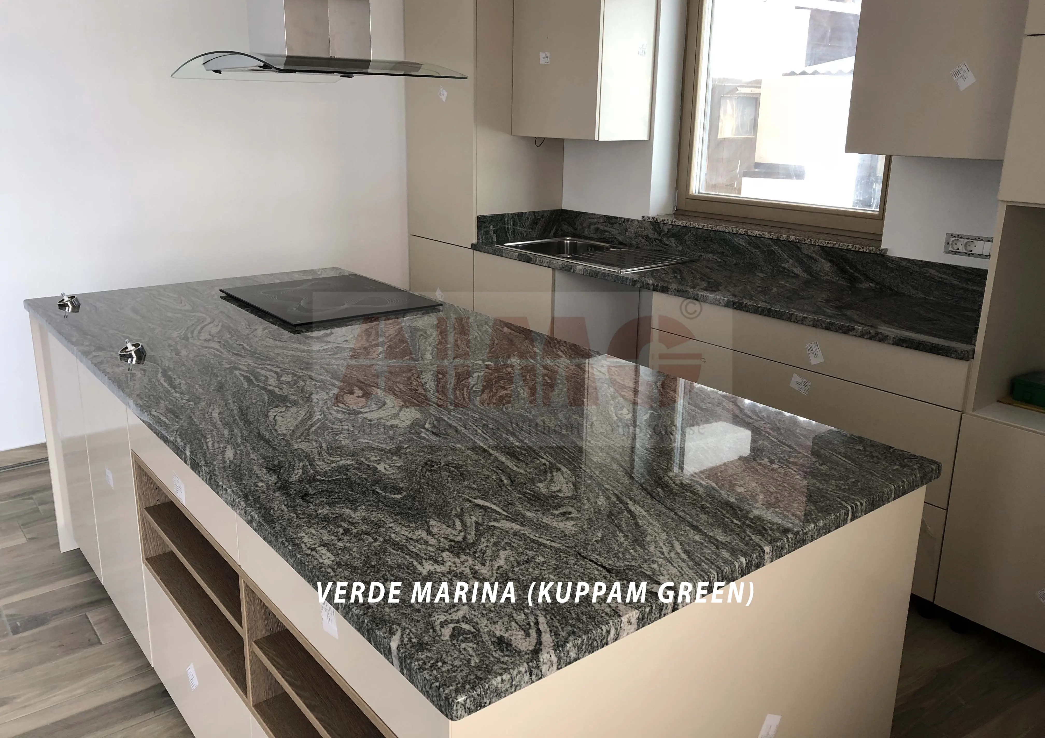 Verde Marina Granite kitchen countertop by Aravali Marbles showcasing rich green wave patterns for modern modular kitchens