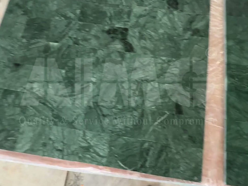 Polished Verde Guatemala green marble surface highlighting intricate veining patterns