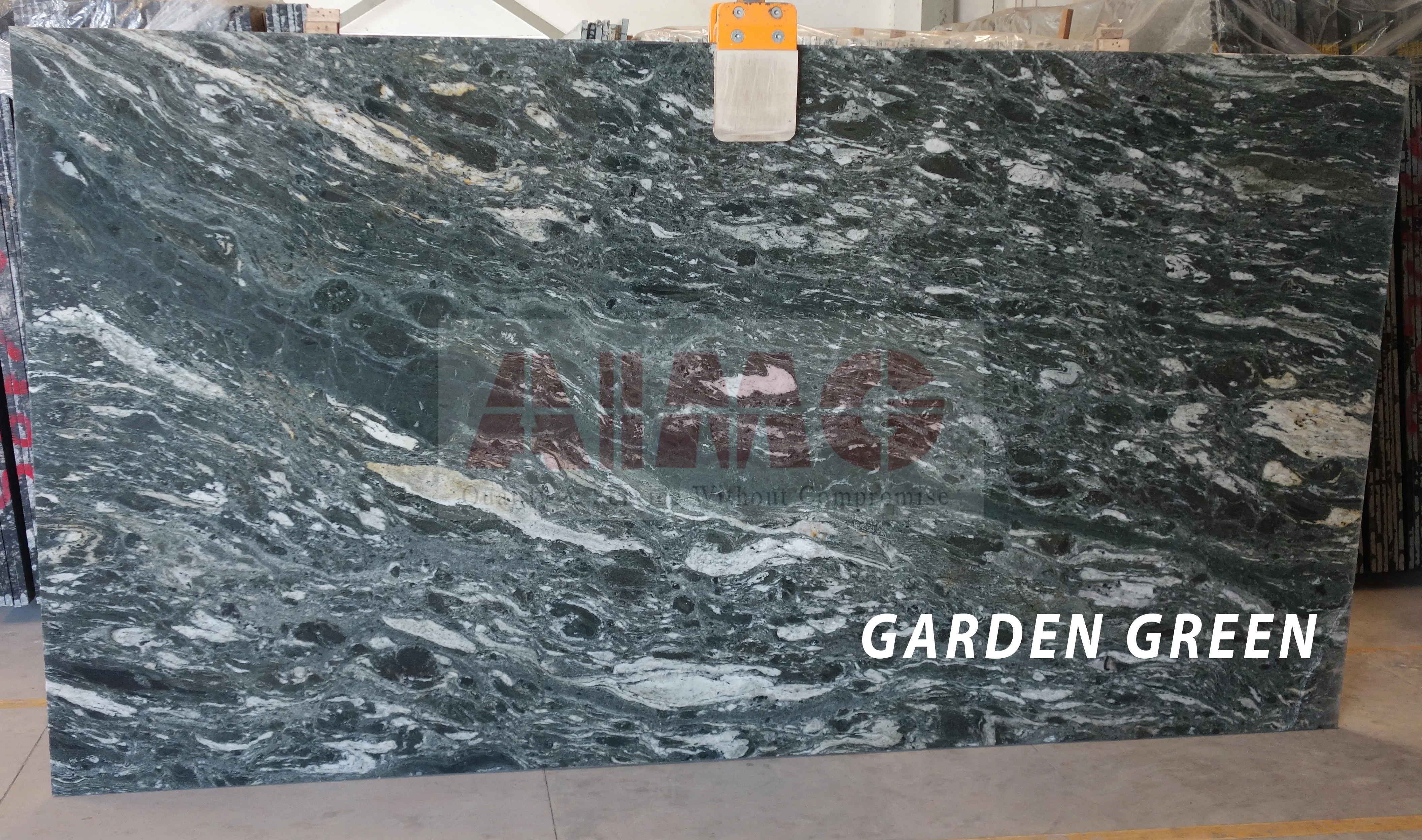 Garden Green Granite slab by Aravali Marbles with dramatic natural green movement ideal for luxury kitchen interiors