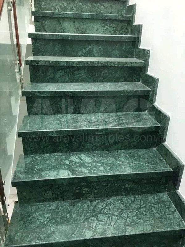 Indoor staircase made entirely of polished Verde Guatemala Marble, supplied by Aravali India Marbles & Granites