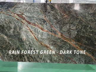 Rainforest Green marble dark tone slab by Aravali Marbles highlighting rich green background with distinctive branch-like veining