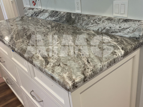 Premium Fantasy Brown Marble countertop and backsplash by Aravali Marbles, combining timeless natural beauty with exceptional durability for modern kitchens.