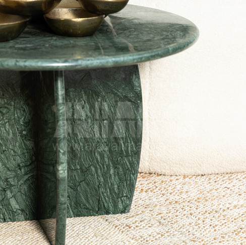 Close-up view of a designer side table made with Verde Guatemala Marble by Aravali India Marbles & Granites