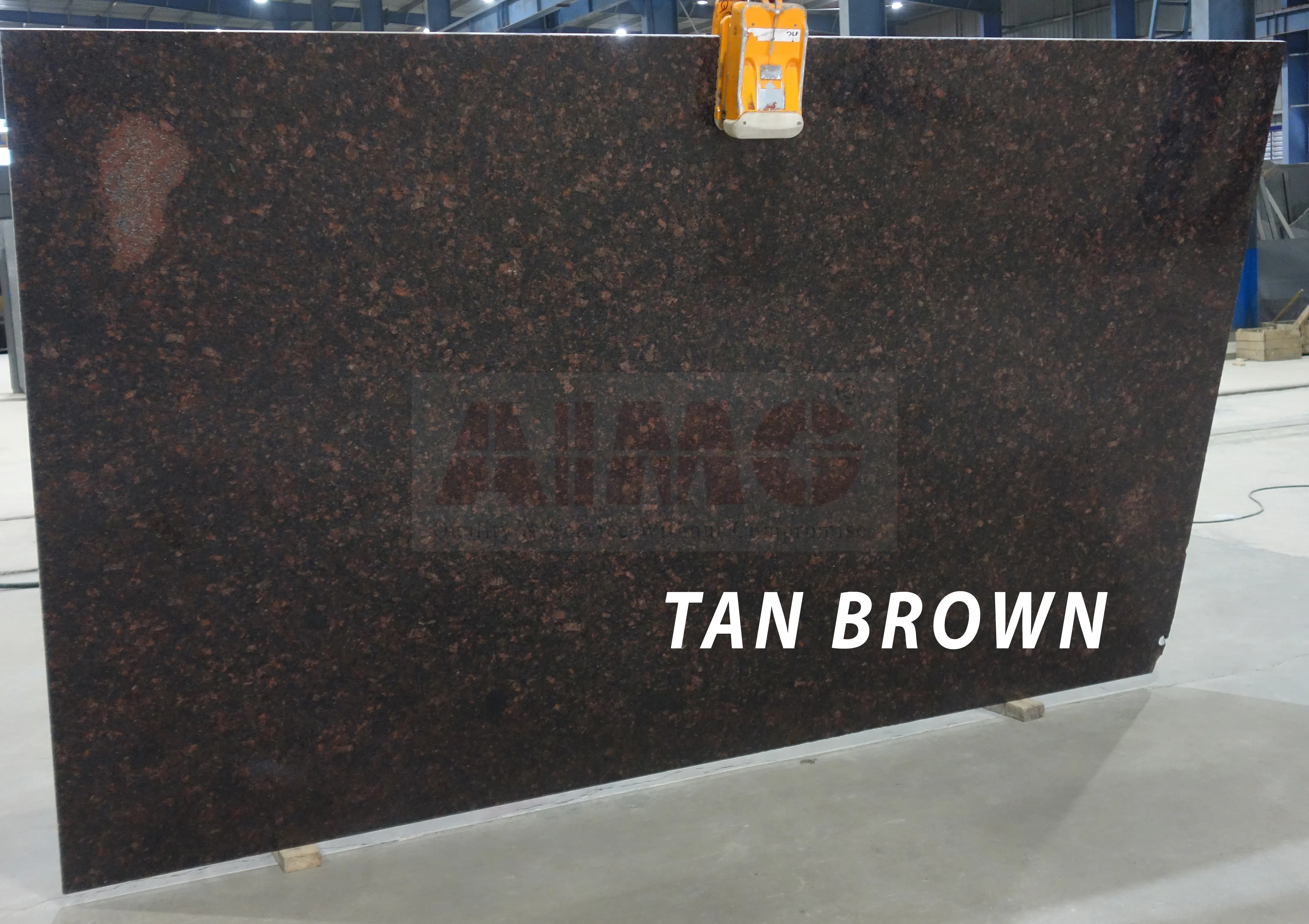 Tan Brown Granite slab by Aravali Marbles showcasing rich brown and black mineral patterns for premium kitchen counters
