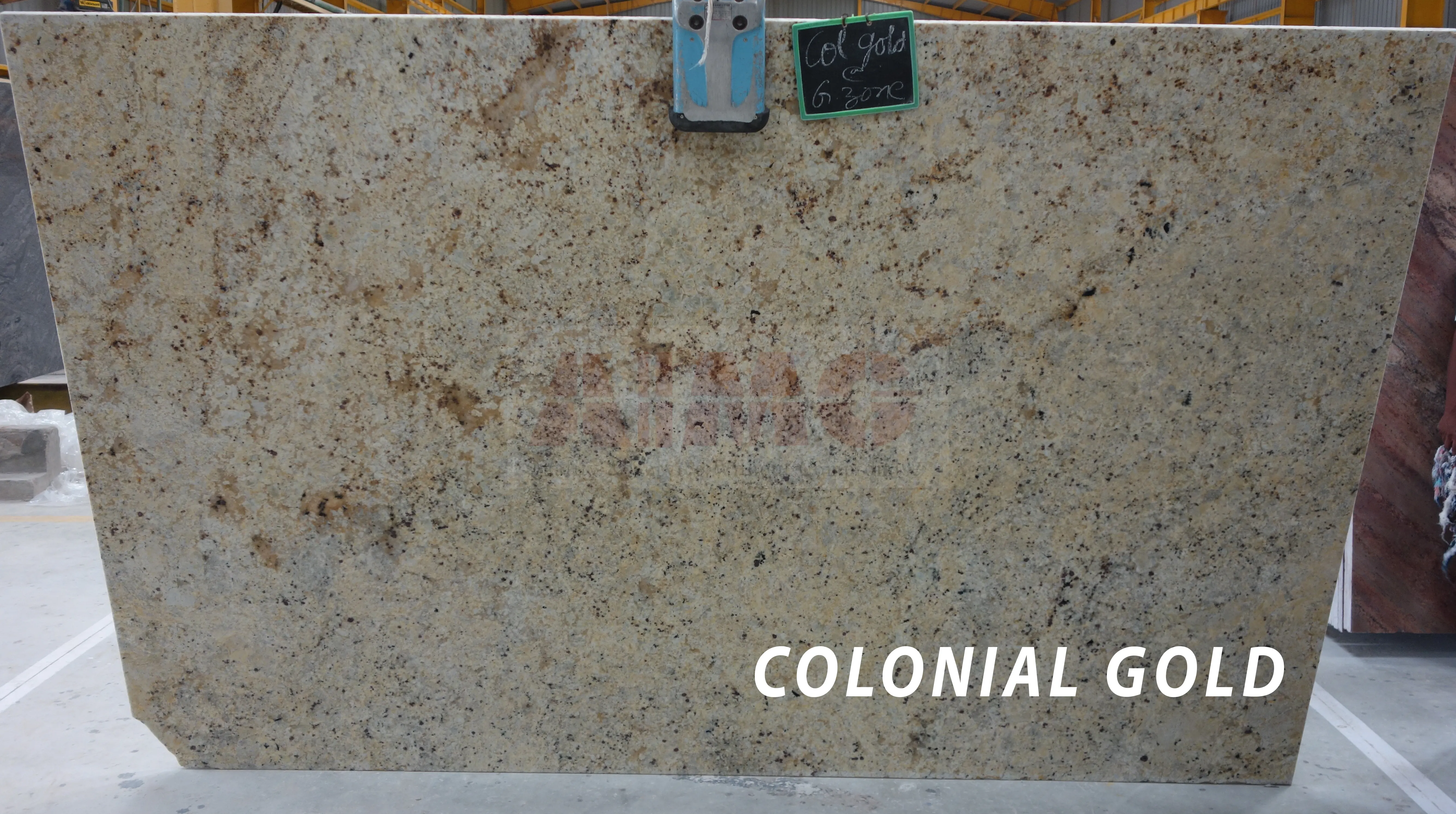 Colonial Gold Granite slab by Aravali Marbles featuring warm golden textures for premium kitchen countertops and luxury interiors