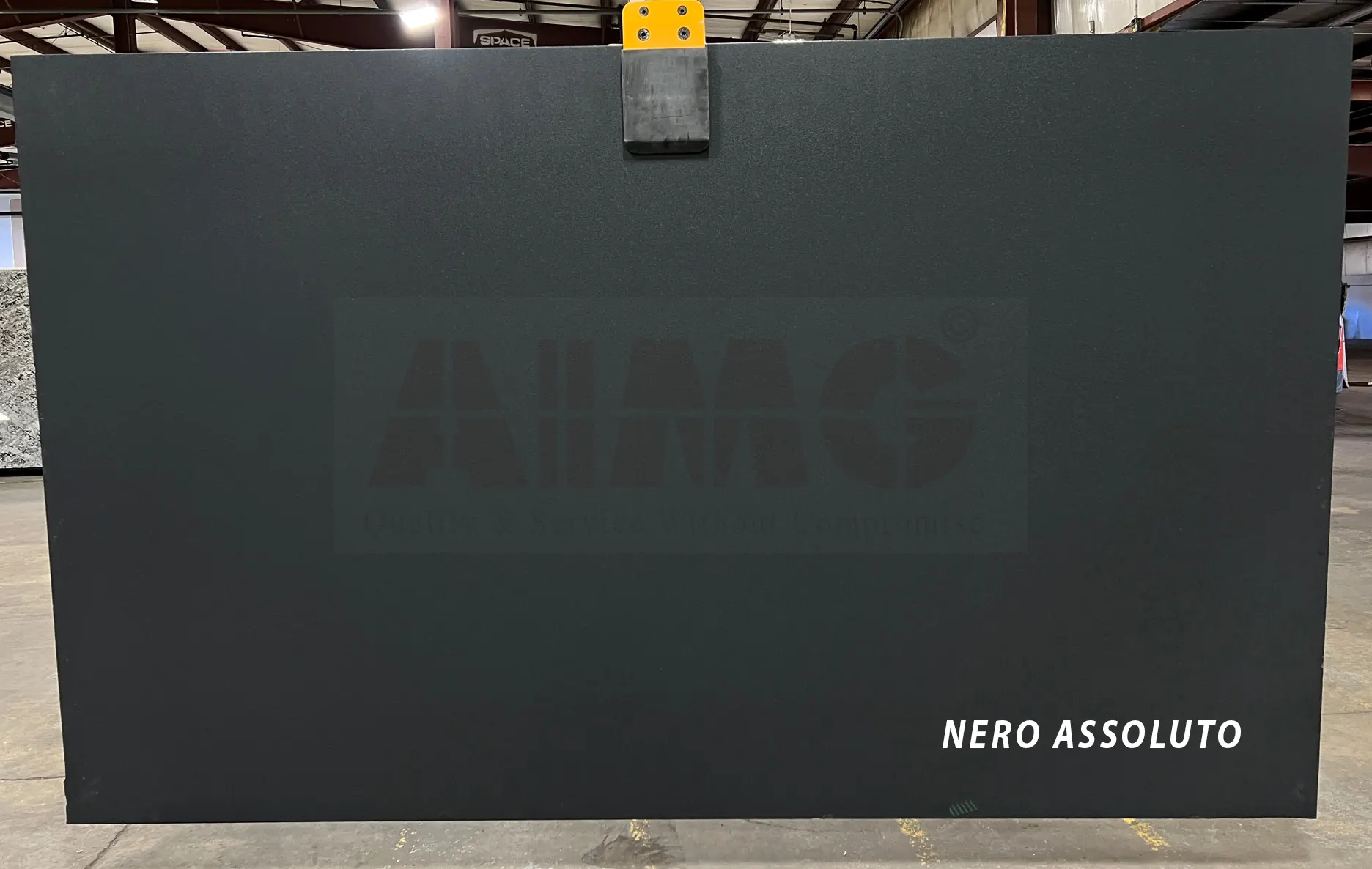Nero Assoluto Black Granite by Aravali Marbles with smooth matte black finish for contemporary kitchen and commercial interiors