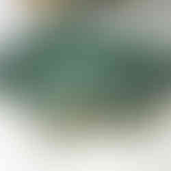 Set of nesting tables with polished Verde Guatemala Marble tops and gold metal frames from Aravali India Marbles & Granites