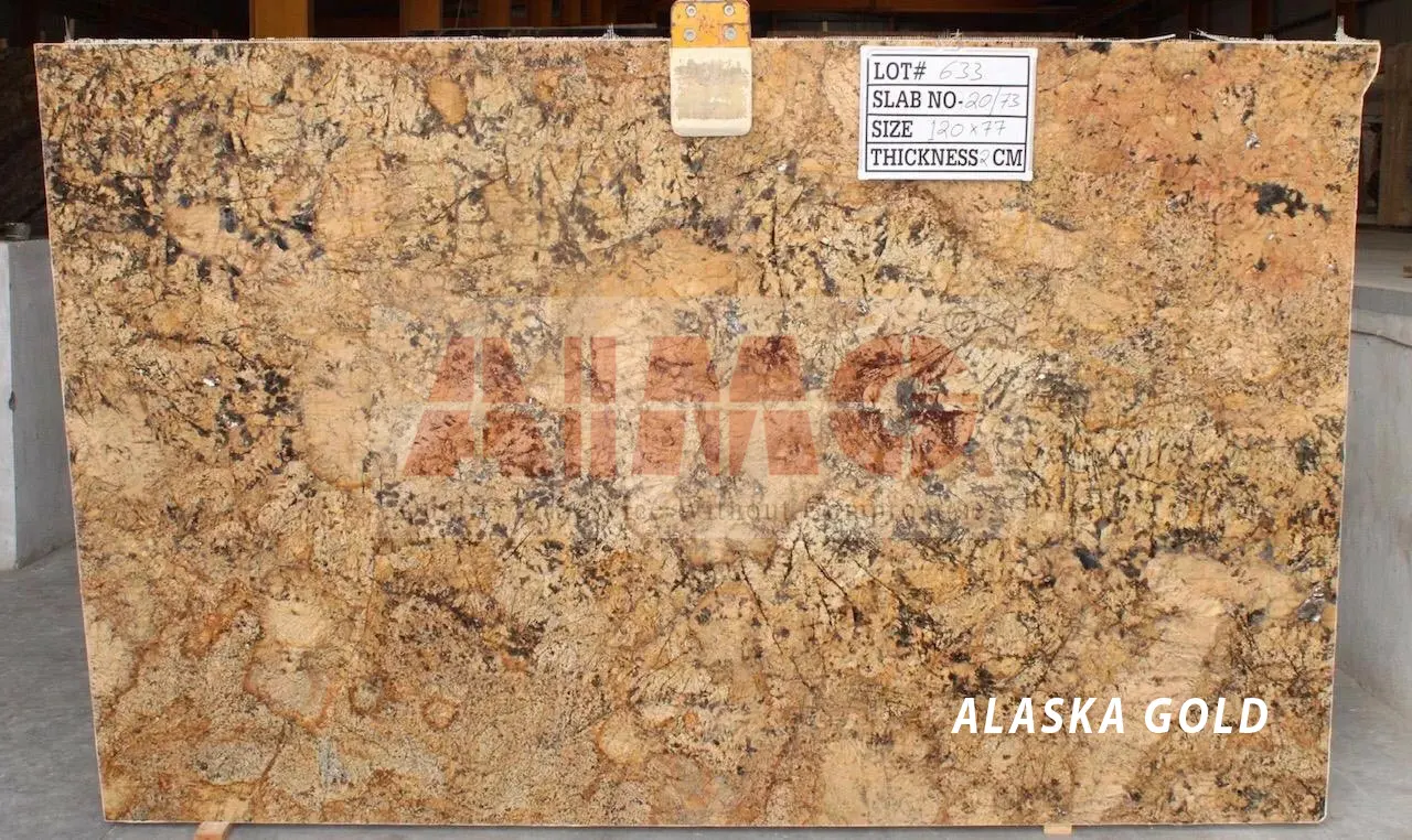 Alaska Gold Granite slab by Aravali Marbles with rich golden mineral detailing ideal for elegant kitchen countertop applications
