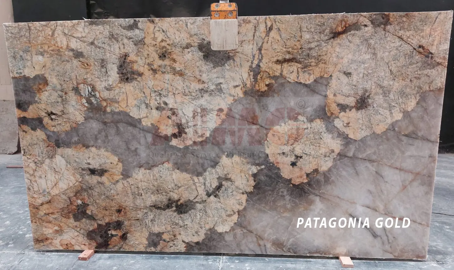 Patagonia Gold Granite slab by Aravali Marbles with dramatic natural gold and beige formations for statement kitchen spaces