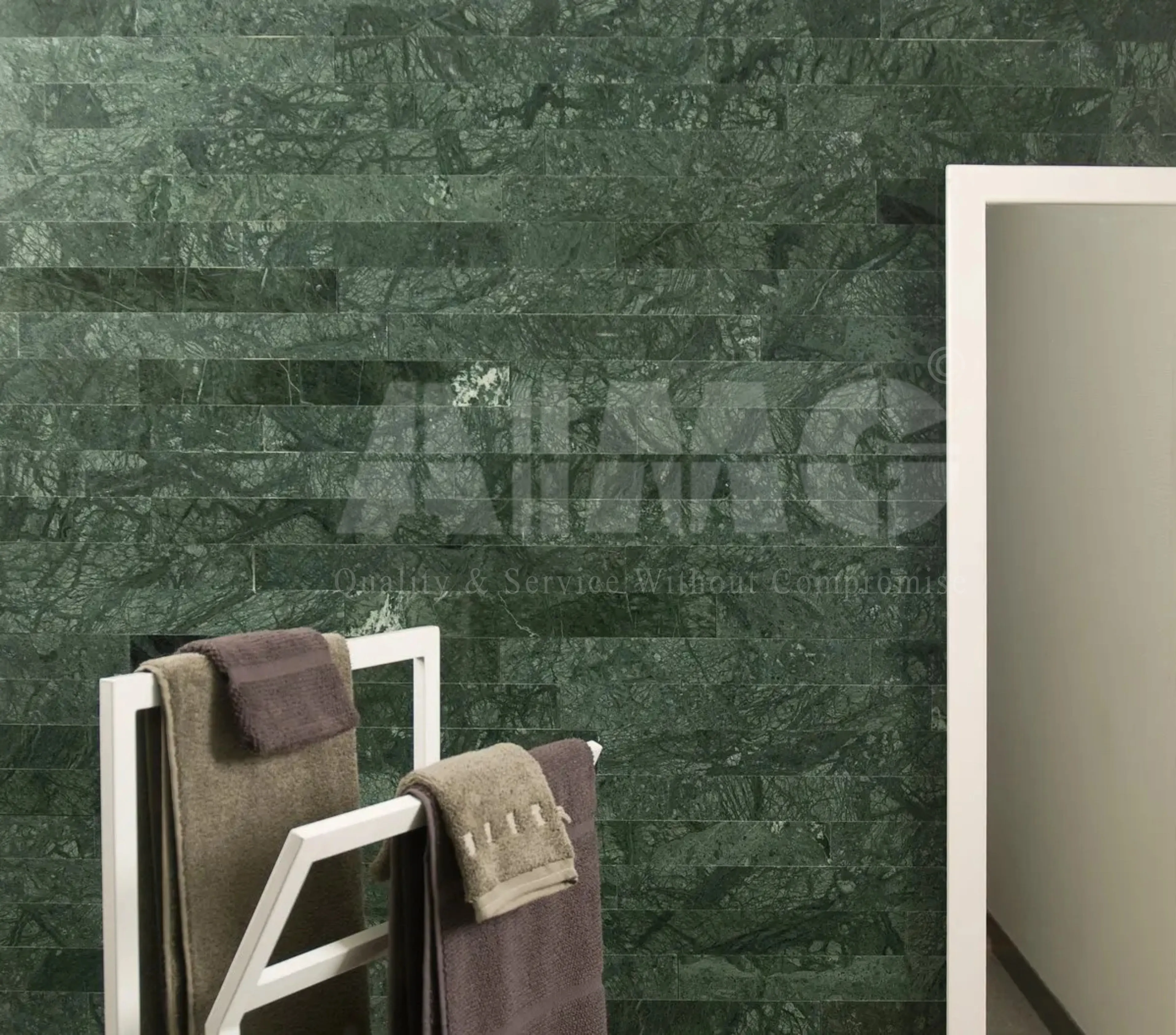 Premium green marble wall cladding by Aravali Marbles featuring polished emerald-green natural stone with rich veining for luxury bathrooms, feature walls, and commercial interiors.