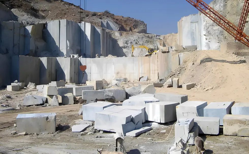 Indian natural stone quarry with large marble blocks being extracted and processed, highlighting the stone manufacturing and export capabilities of Aravali Marbles, a leading supplier and exporter of premium Indian Green Marble from Udaipur.