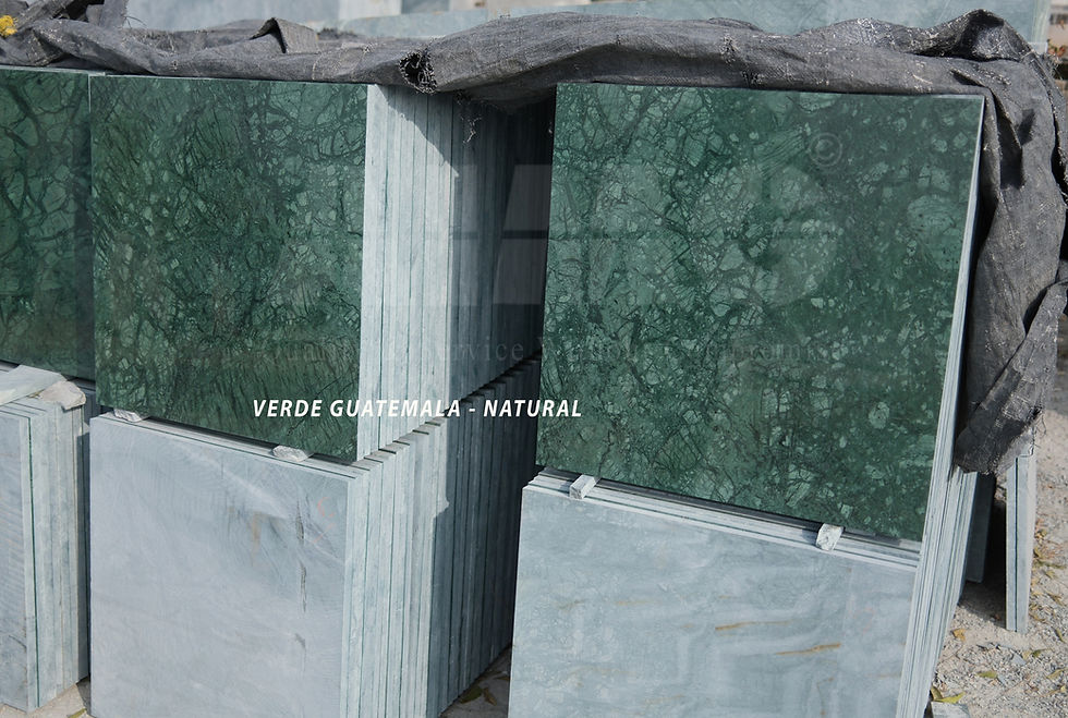 Verde Guatemala green marble slabs stacked at factory with natural deep green color and white veining