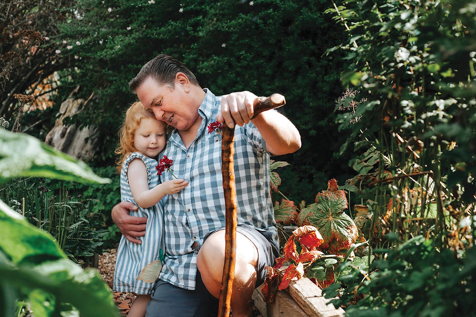 A beautiful picture of a country gentleman embracing a young family member