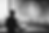Executive architect overlooking a city skyline while a glowing AI brain projects capability maps—symbolizing AI-accelerated strategic architecture.