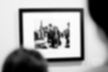 Custom black and white photo in a frame. Black frame with a white mounting board.