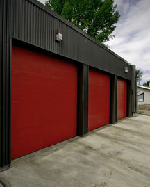Black and red painted rollup garage doors