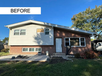 Residential home exterior brick and siding before painting service