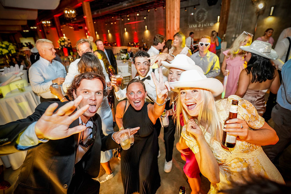 Wedding guests celebrating on a packed dance floor at Park Crest Event Facility during a high-energy reception by Platinum Entertainment