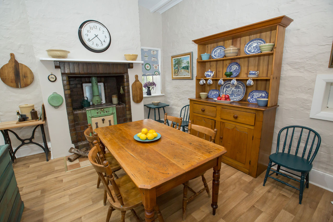 Burra House's spacious eat-in kitchen features modern appliances and essential amenities.