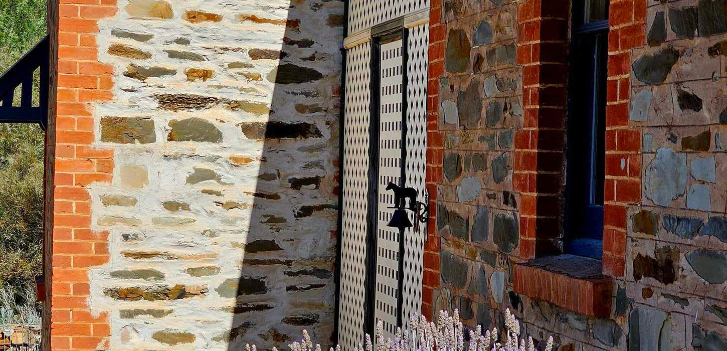 This pretty stone cottage comprises one bedroom with an antique brass Queen size bed, a cosy sitting/dining room with a kitchenette and bathroom.