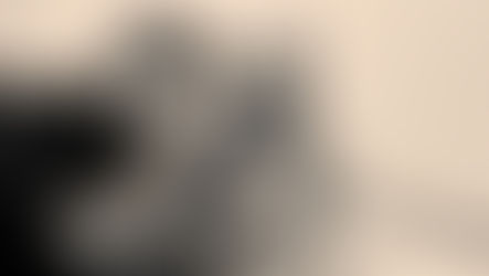 Dr. Sparks looking into a child’s ear