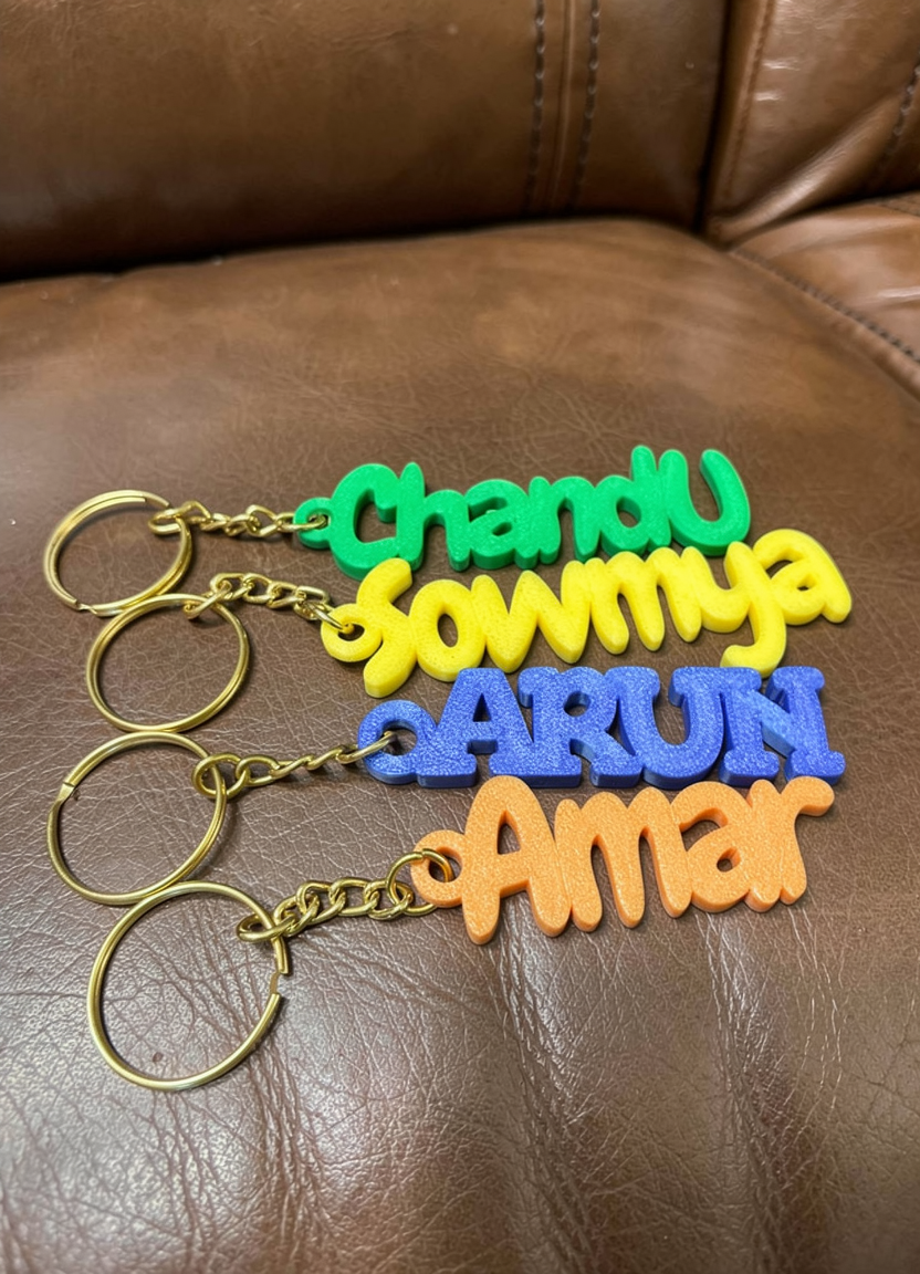 Custom name keychains: Chandu, Sowmya, Arun, Amar
