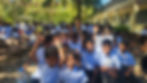 Excited and happy students looking forward to the new school year as the wet season finishes.