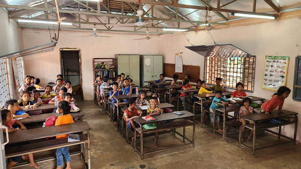 Full of mischief but the teachers manage these large classes admirably.