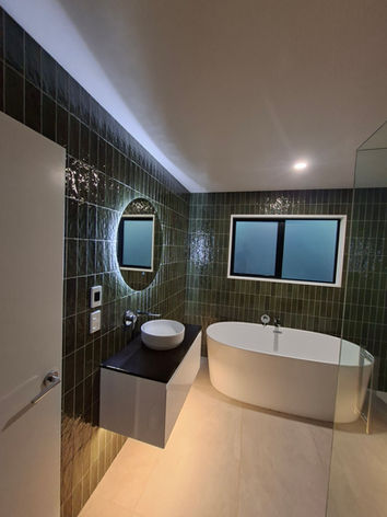Black Tile Renovated Bathroom
