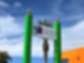 Commercial street sign of Quints Travelers Inn