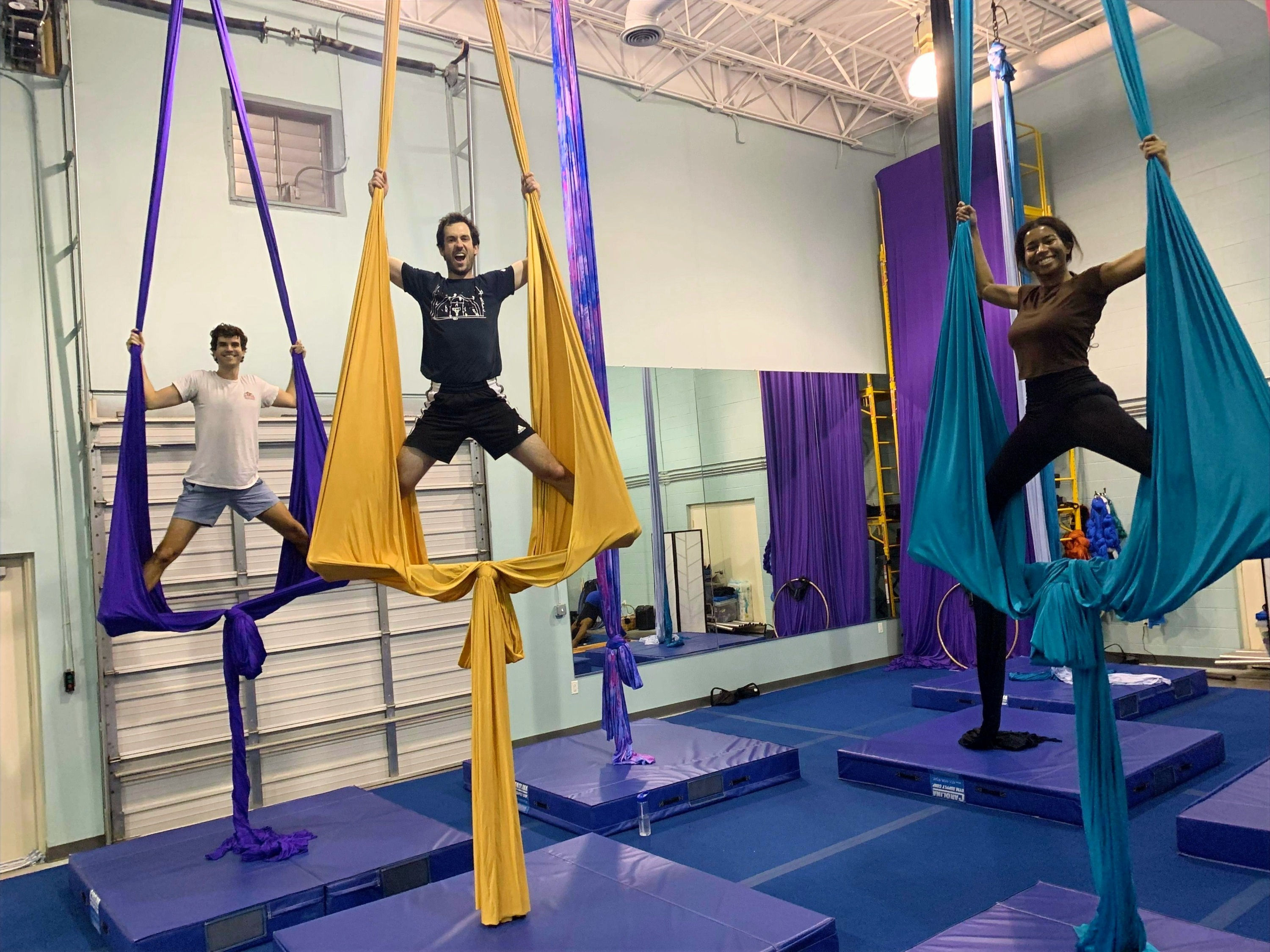 Jamie Ramirez performing on aerial sling (aerial hammock)