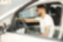young-man-in-glasses-polishing-inside-his-car-with-rug-man-wearing-white-t-shirt.jpg