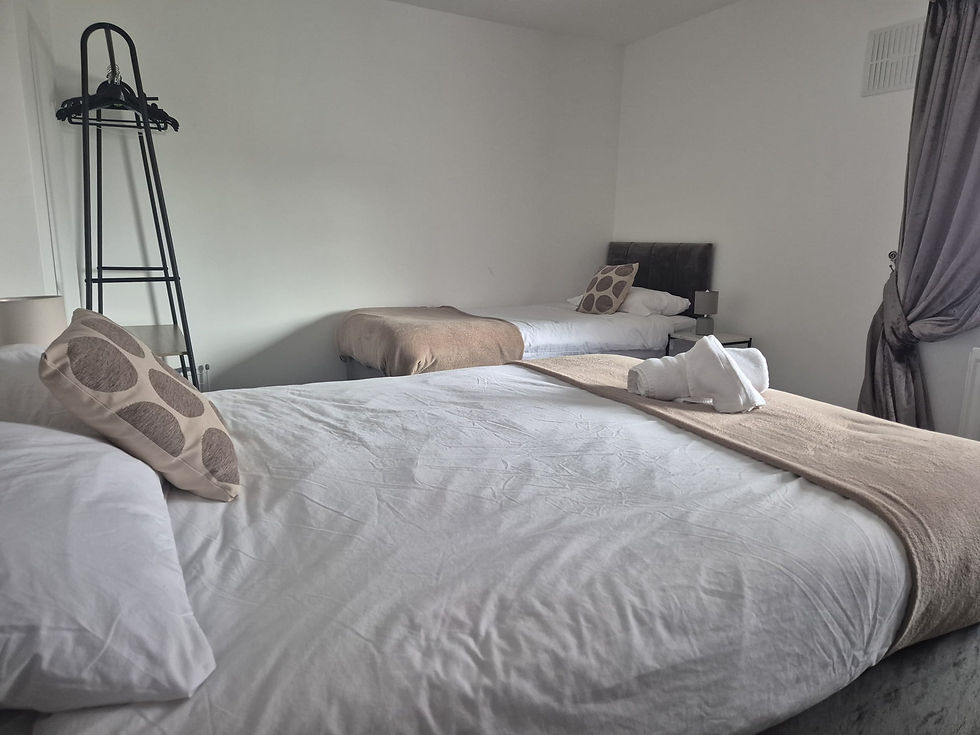 Bedroom at Loxdale with double and single beds