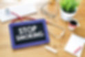 Stop smoking on blackboard. Handwritten stop smoking with chalk on blackboard,stethoscope