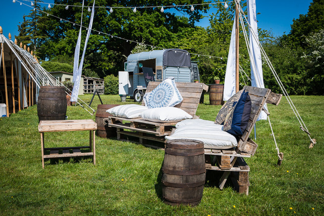 Pallet Sofas, Rustic Coffee Table and Small Barrel