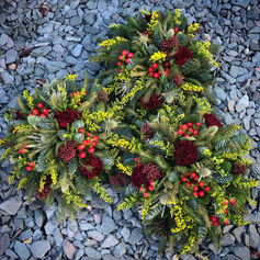 Yellow and red grave posies (£25.00 each)