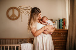 Mother and son in his nursery