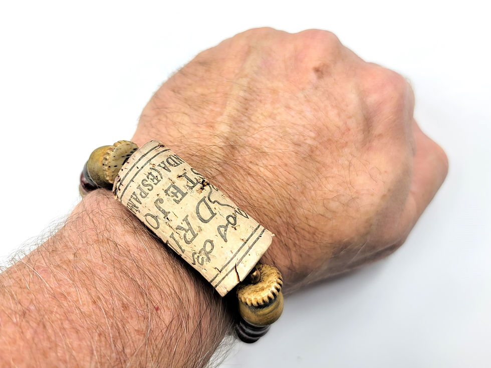 Thumbnail: Photo of a man's wrist wearing the Islands To Highlands Wine in Madrid Bracelet.