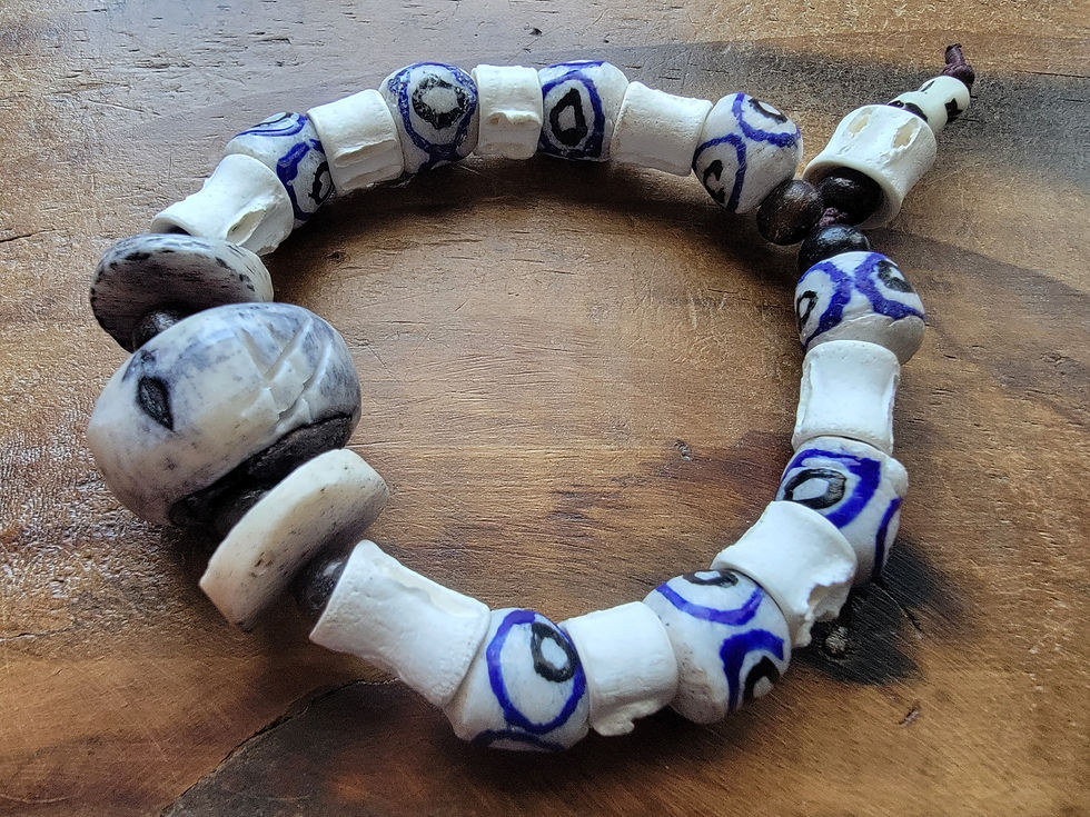 Thumbnail: Photograph of the Islands To Highlands Kastellorizo Island Bracelet on an antique desk.